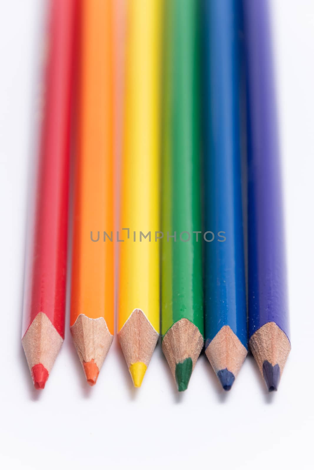 Crayons colored pencil in different colors crayon rainbow colors by MXW_Stock