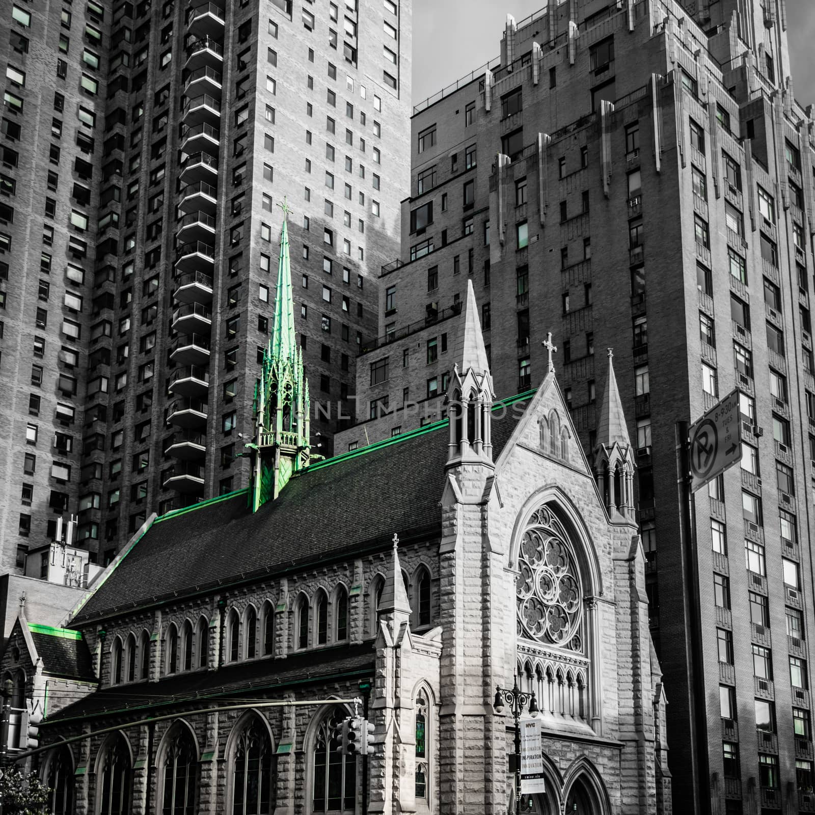 Church in New York Manhattan caught by the modern skyscrapers by MXW_Stock