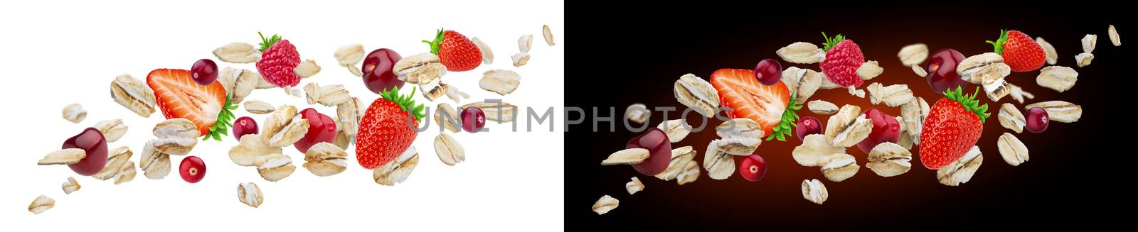 Flying oat flakes with berries isolated on white and black backgrounds by xamtiw
