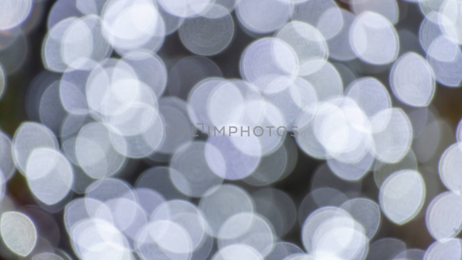 Abstract & Festive background with bokeh defocused lights