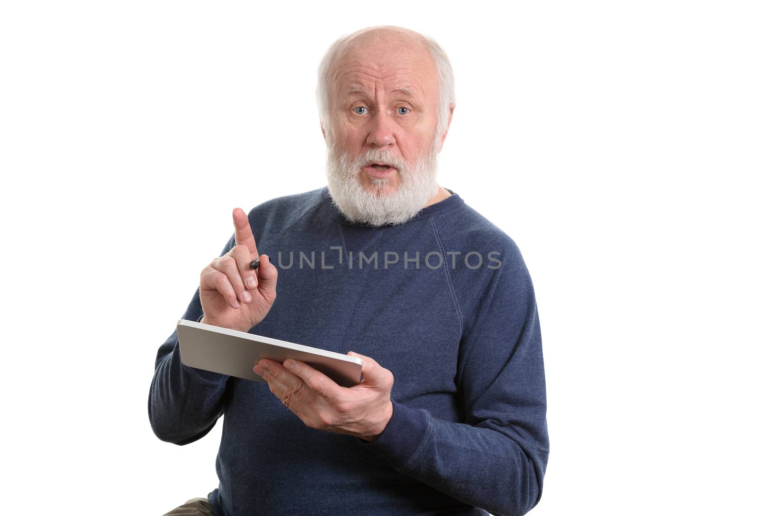 Funny bald and bearded old man using tablet computer, isolated on white