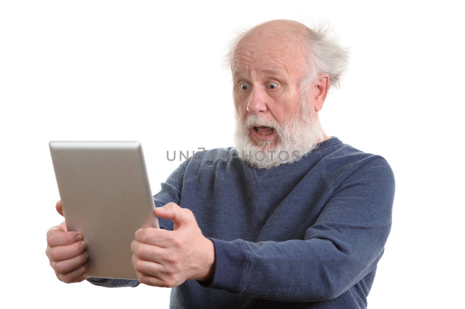 Funny shocked astonished old man using tablet computer, isolated on white