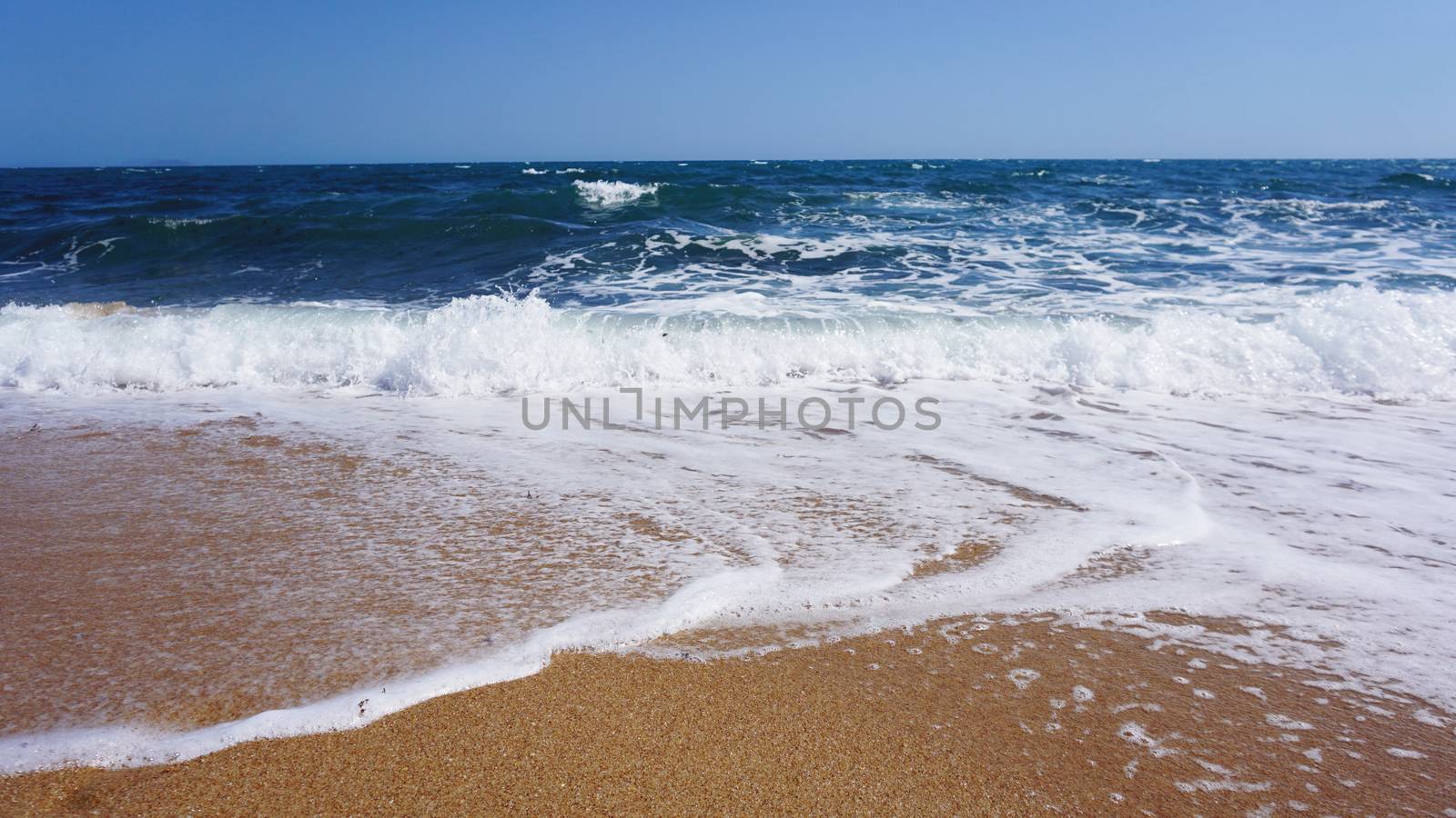 Tropical beach. Ocean wave background. Sand and blue sea. Ocean water nature, beach relax. Summer sea vacation