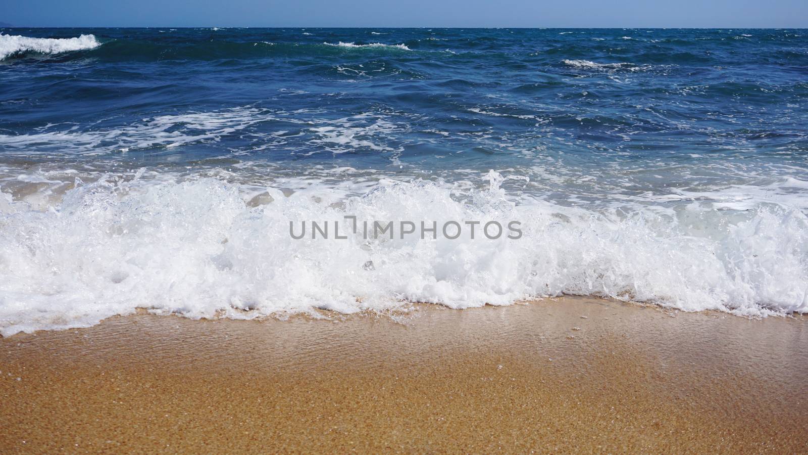 Tropical beach. Ocean wave background. Sand and blue sea. Ocean water nature, beach relax. Summer sea vacation