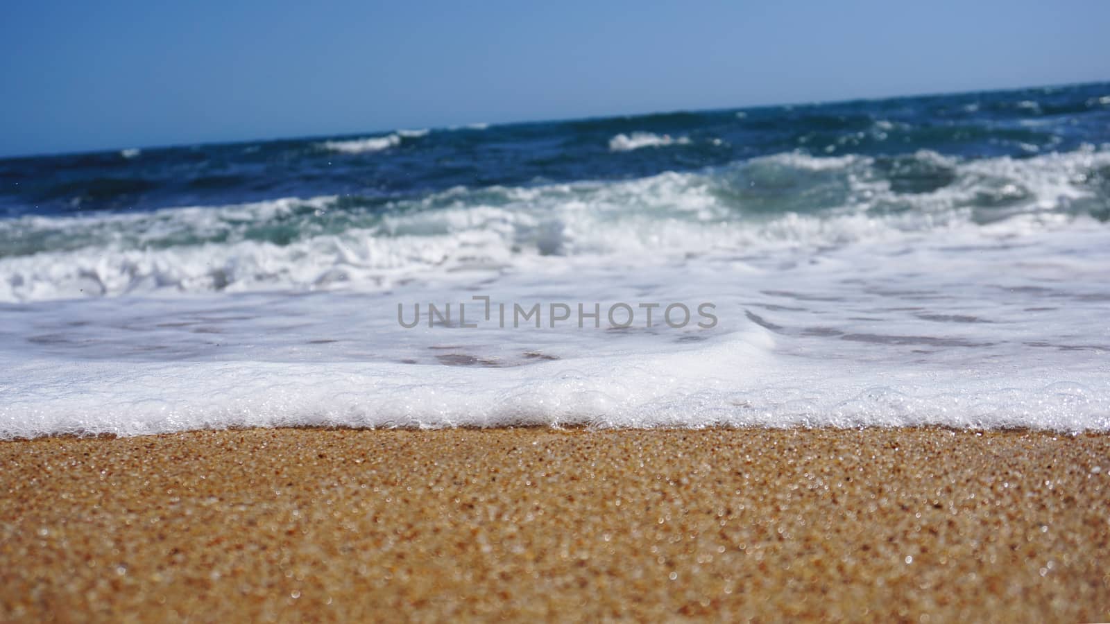 Tropical beach. Ocean wave background. Sand and blue sea. Ocean water nature, beach relax. Summer sea vacation