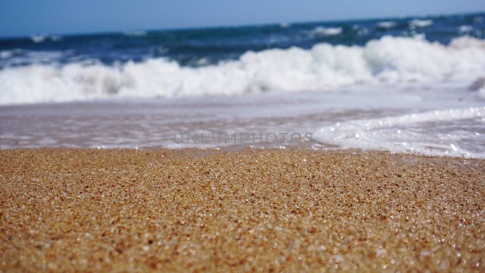 Tropical beach. Ocean wave background. Sand and blue sea. Ocean water nature, beach relax. Summer sea vacation