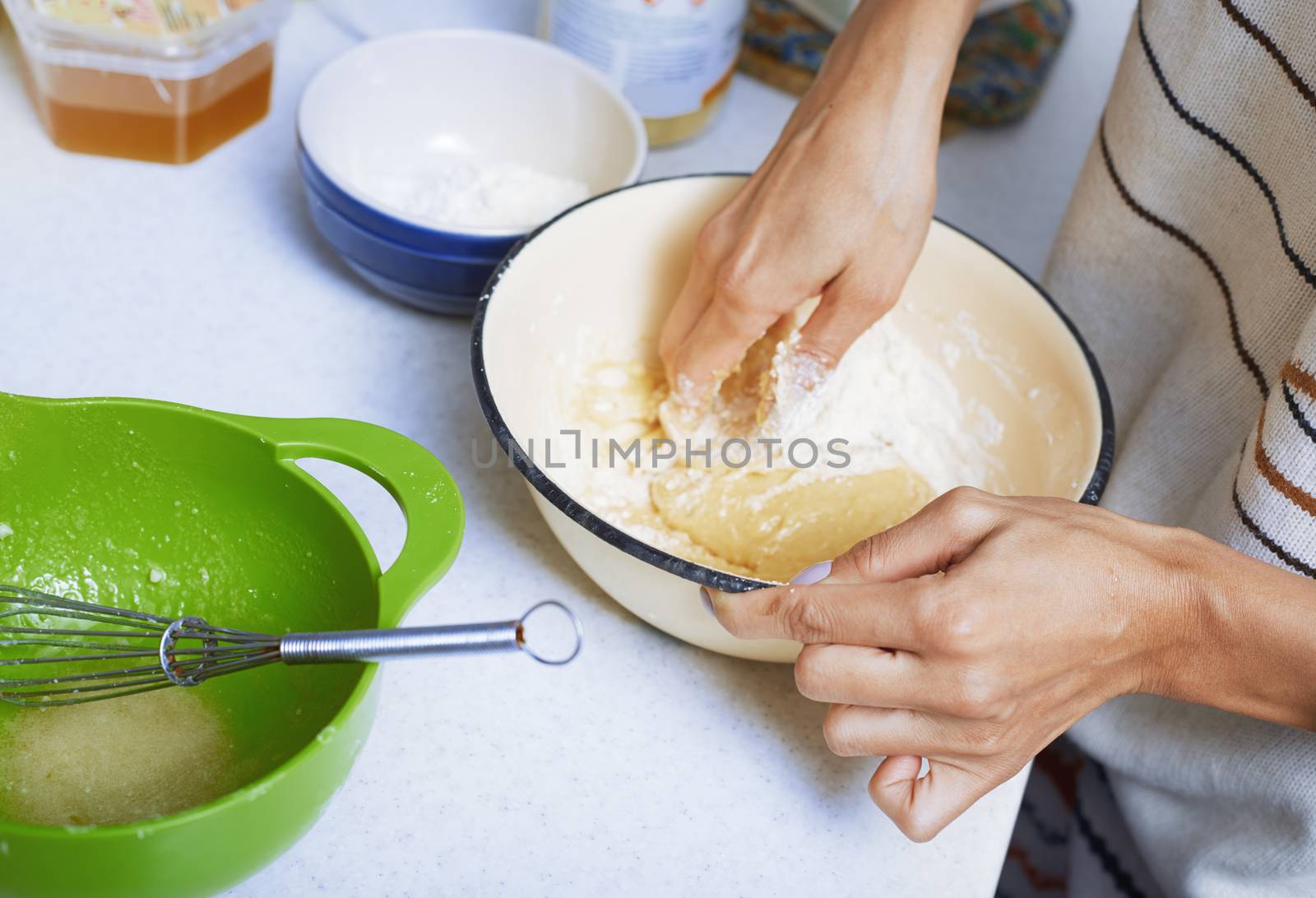 Hands of the woman preparing pie pastry