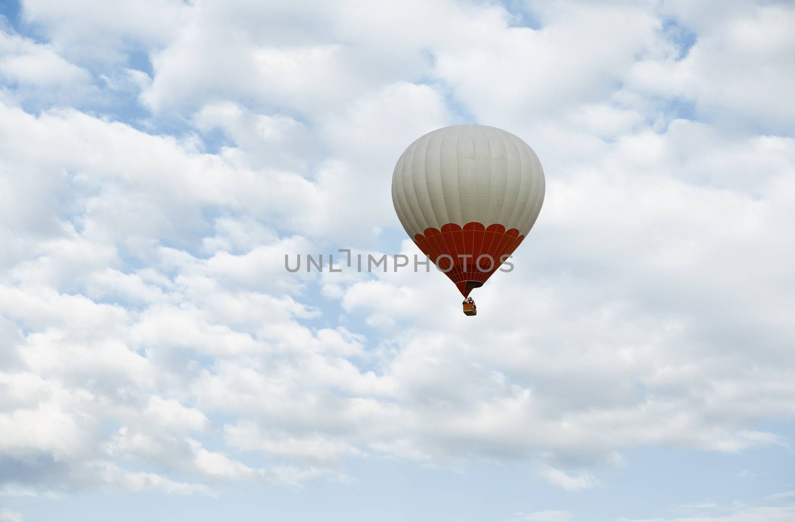 One hot air balloon flying in the sky by Novic