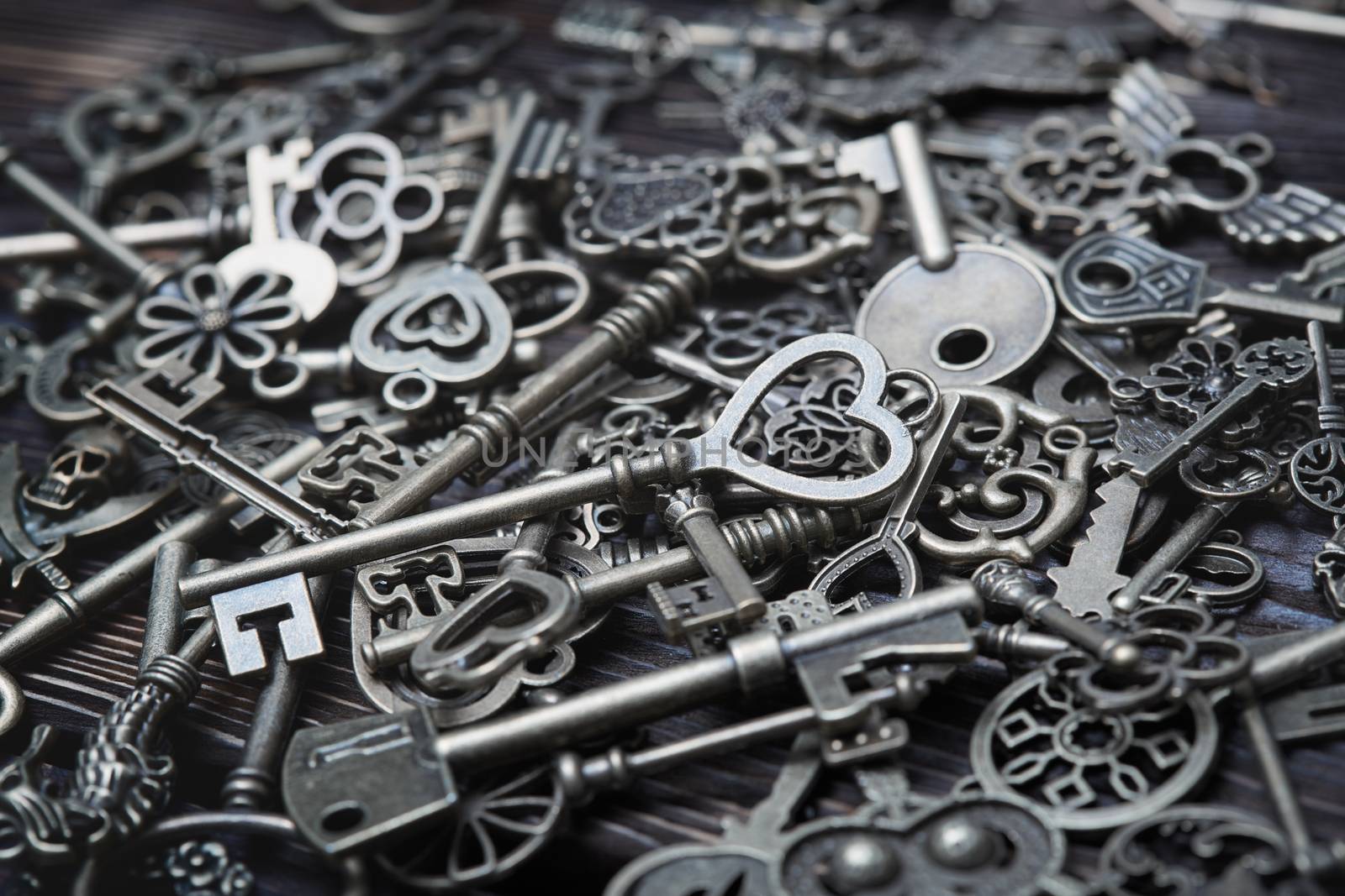 Full frame photo of the various antique keys. Close-up