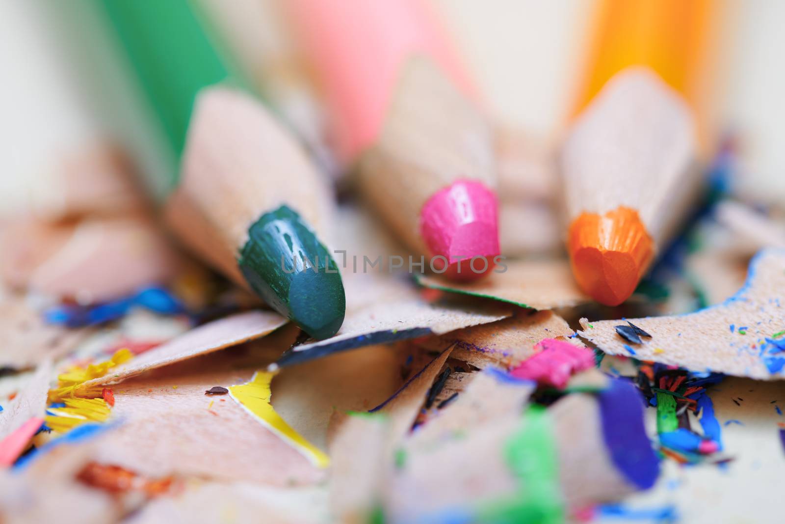 Closeup on sharpened colored pencils with shavings