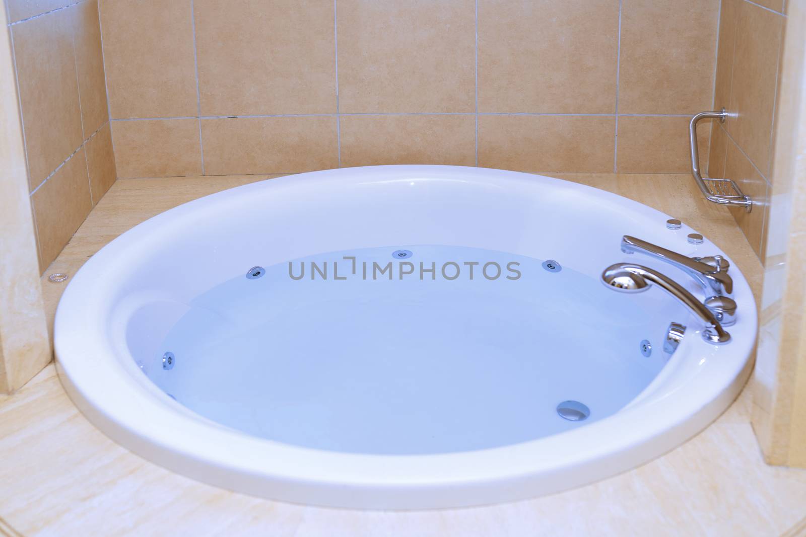 Modern bathtub full of water