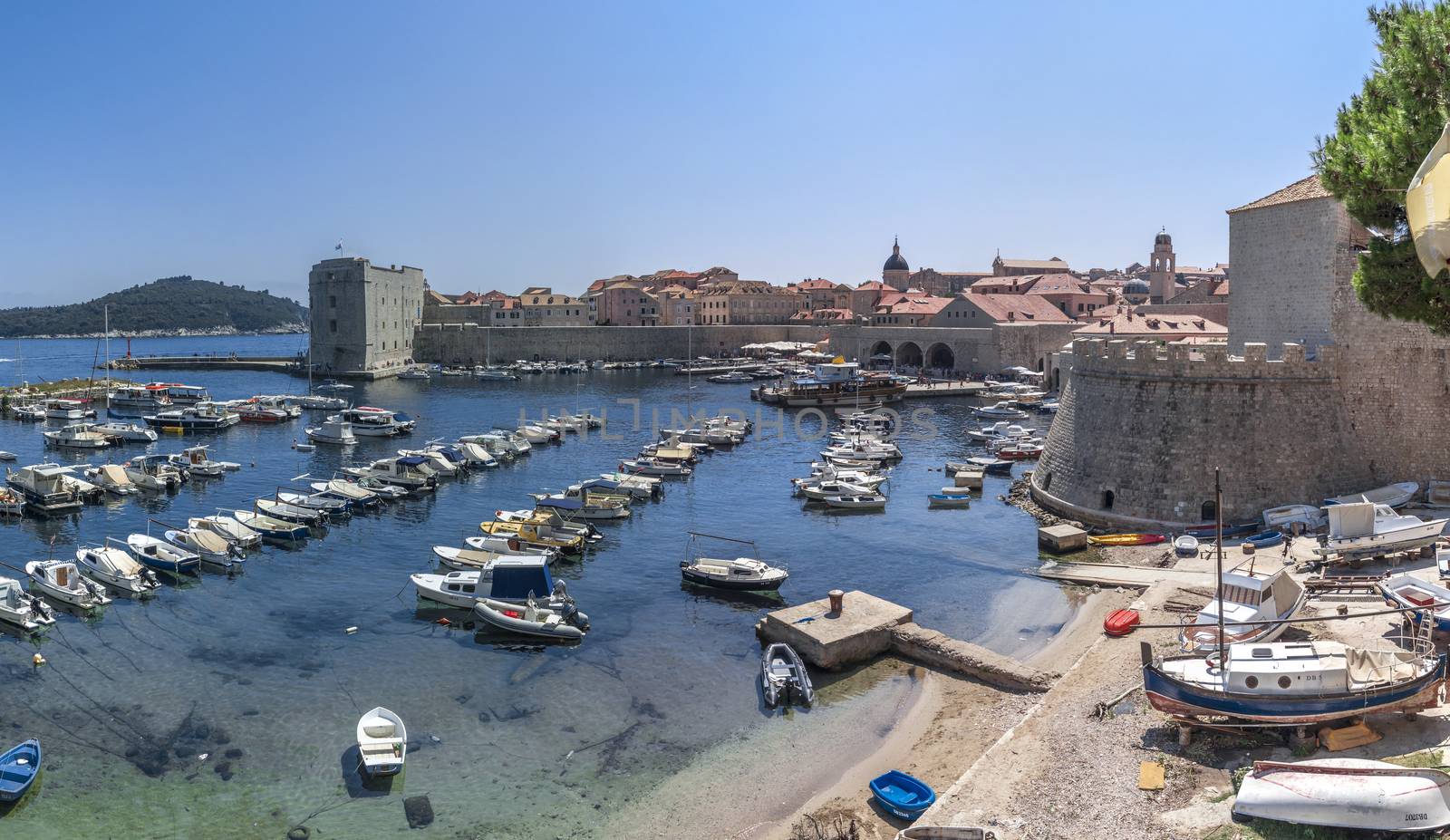 Dubrovnik, Croatia - 07. 13. 2018. Fort St. Ivana and Old Port in Dubrovnik, Croatia, panoramic view on a sunny summer day.