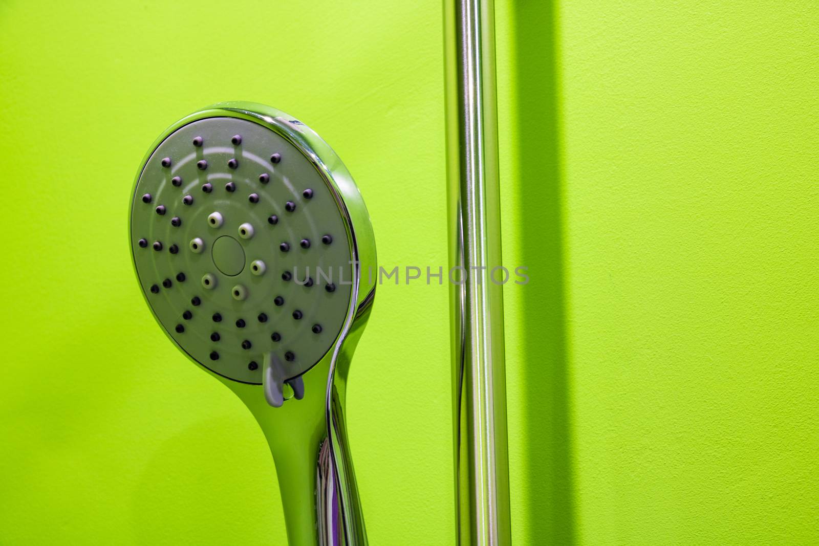 Shower head in bathroom with water spray or water flow. modern shower head in modern bathroom. by kip02kas