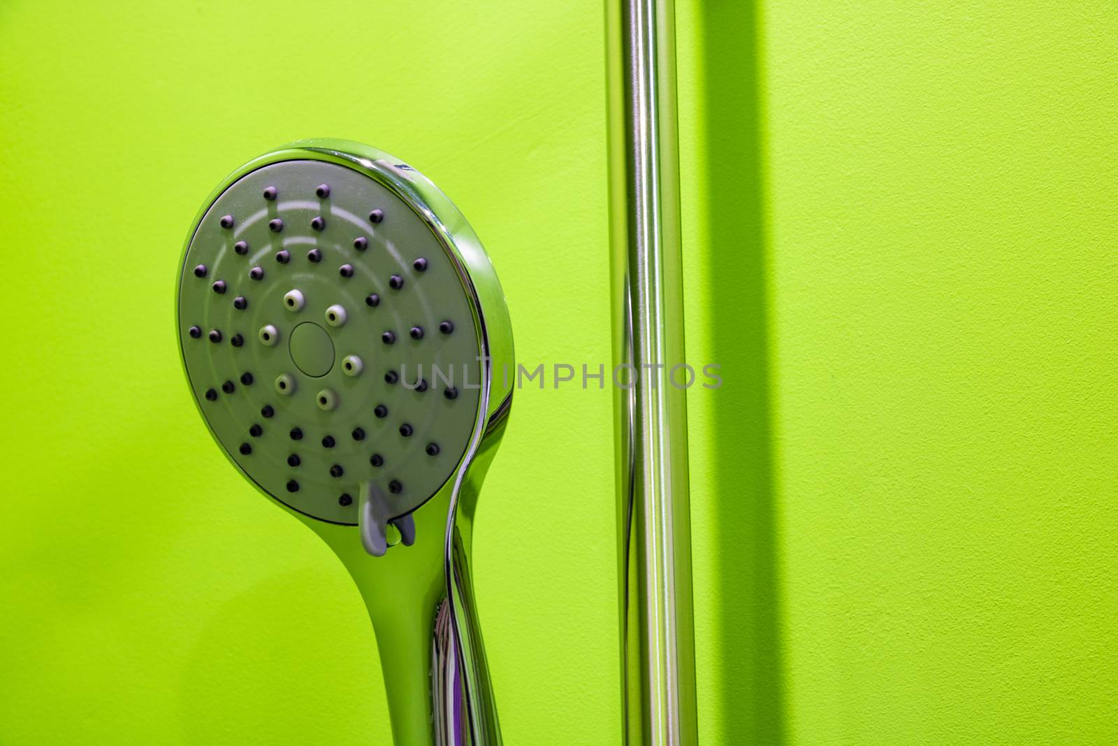 Shower head in bathroom with water spray or water flow. modern shower head in modern bathroom