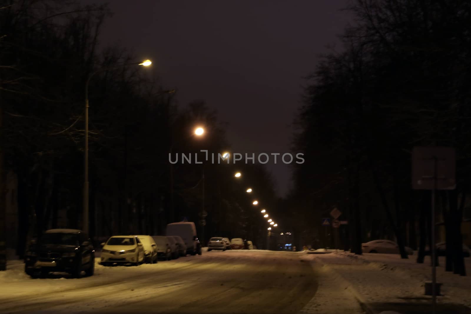 Parked cars covered with snow - snow storm