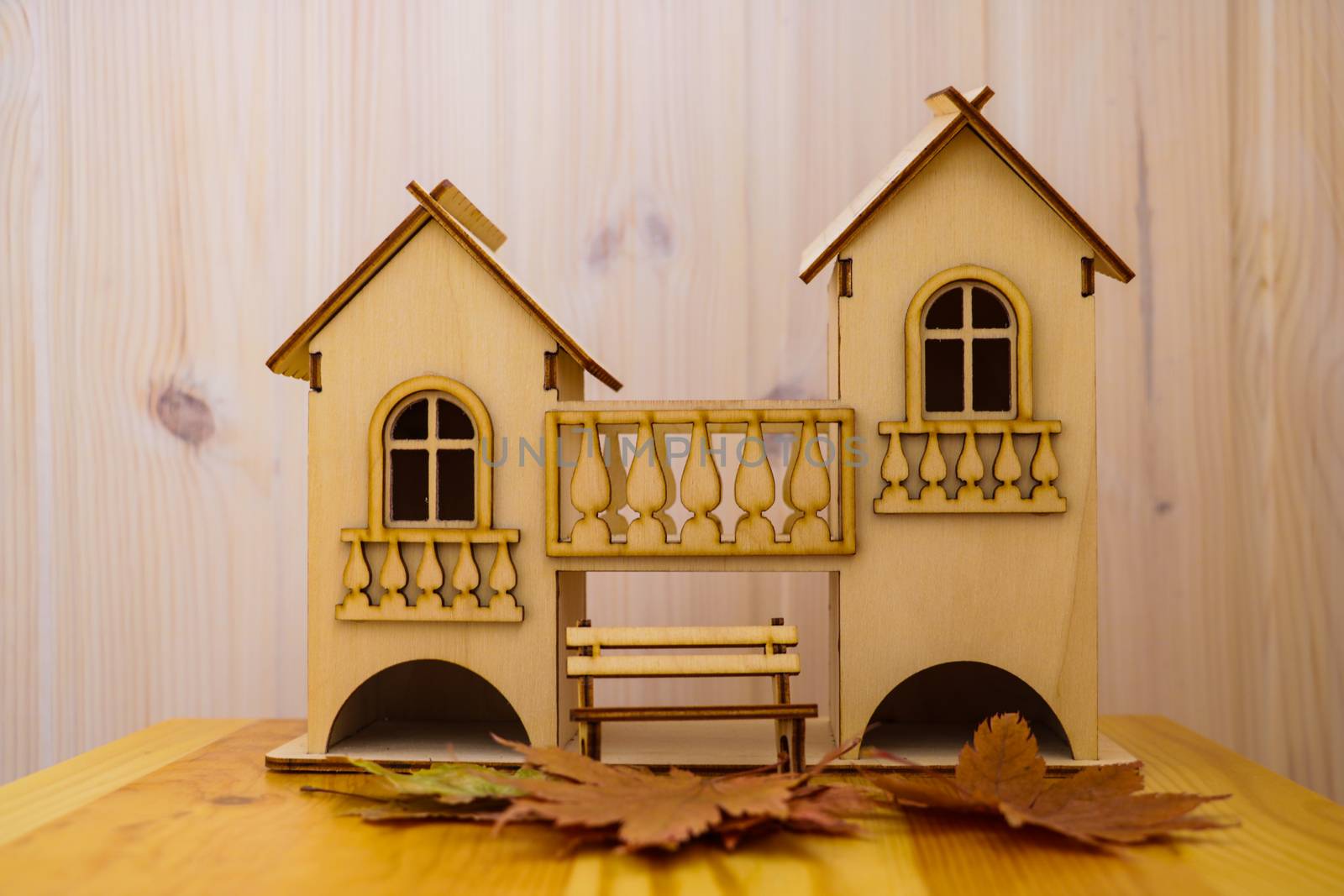 wooden house model with background of starting construction house ,my house concept. by kip02kas