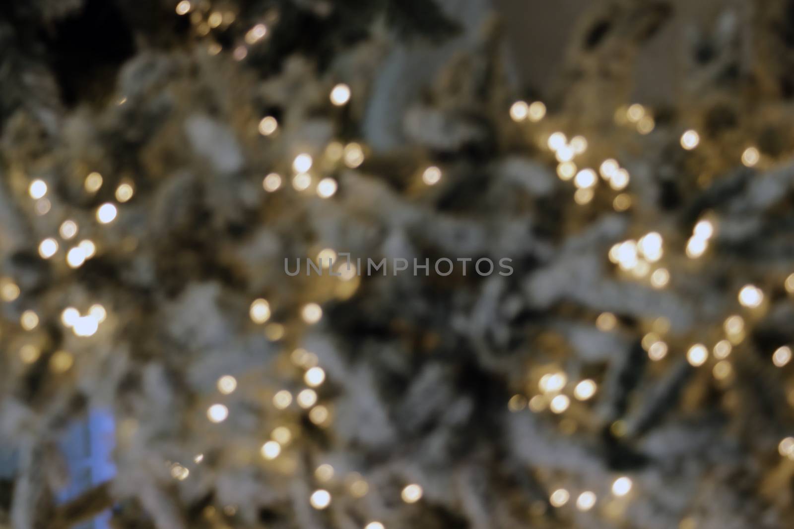 christmas background, image blur colorful bokeh defocused lights decoration on christmas tree