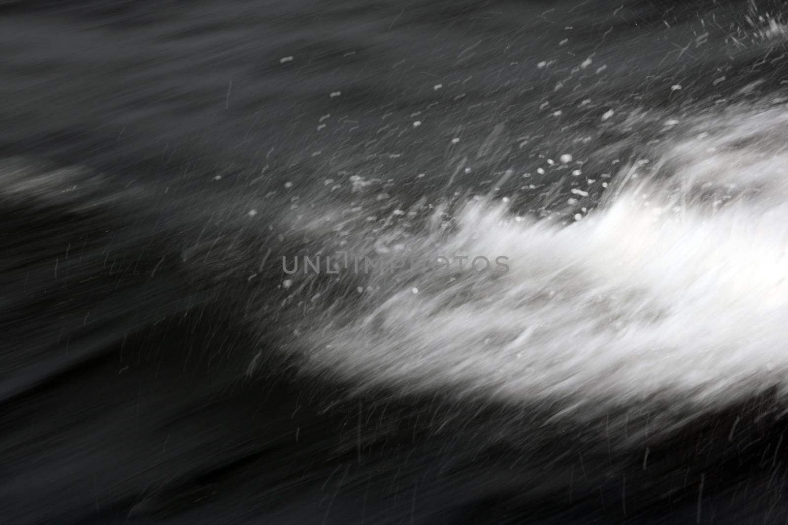 Blur abstract background. Water spray from a boat or ship. by kip02kas