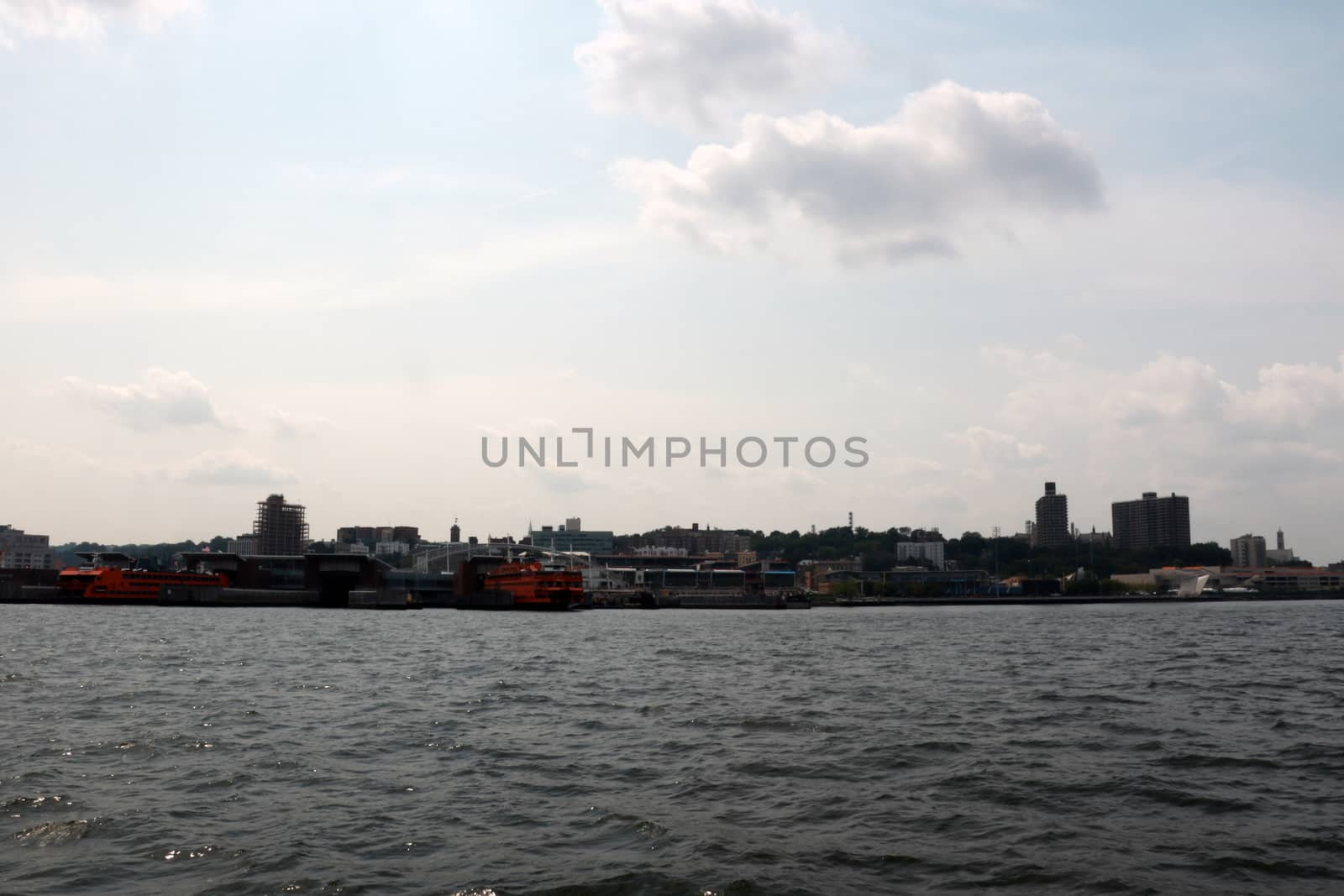 View of the city on a cloudy day from the water