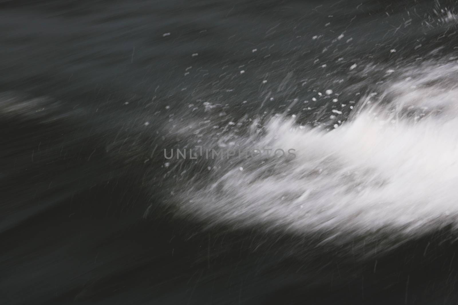 Blur abstract background. Water spray from a boat or ship