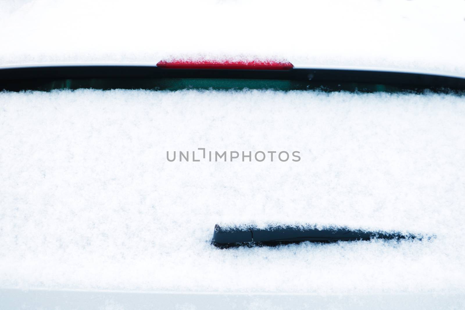 car windshield wiper in the snow
