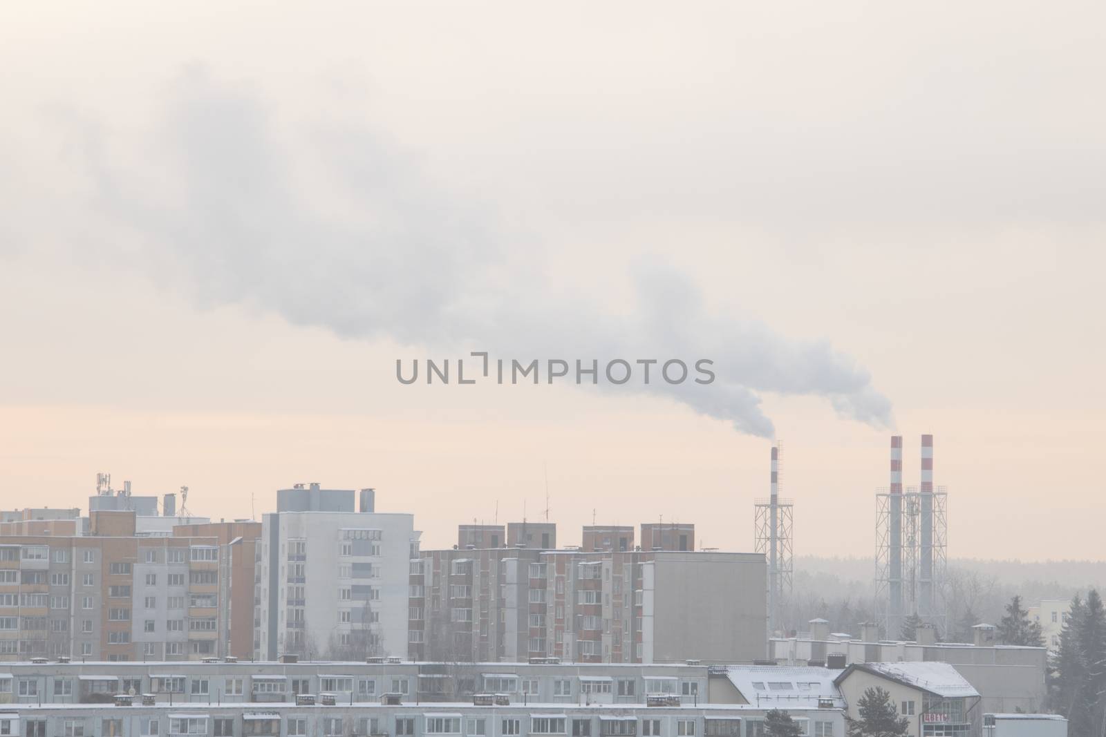 Smoking a pipe of heating plants supplying heat to the city.