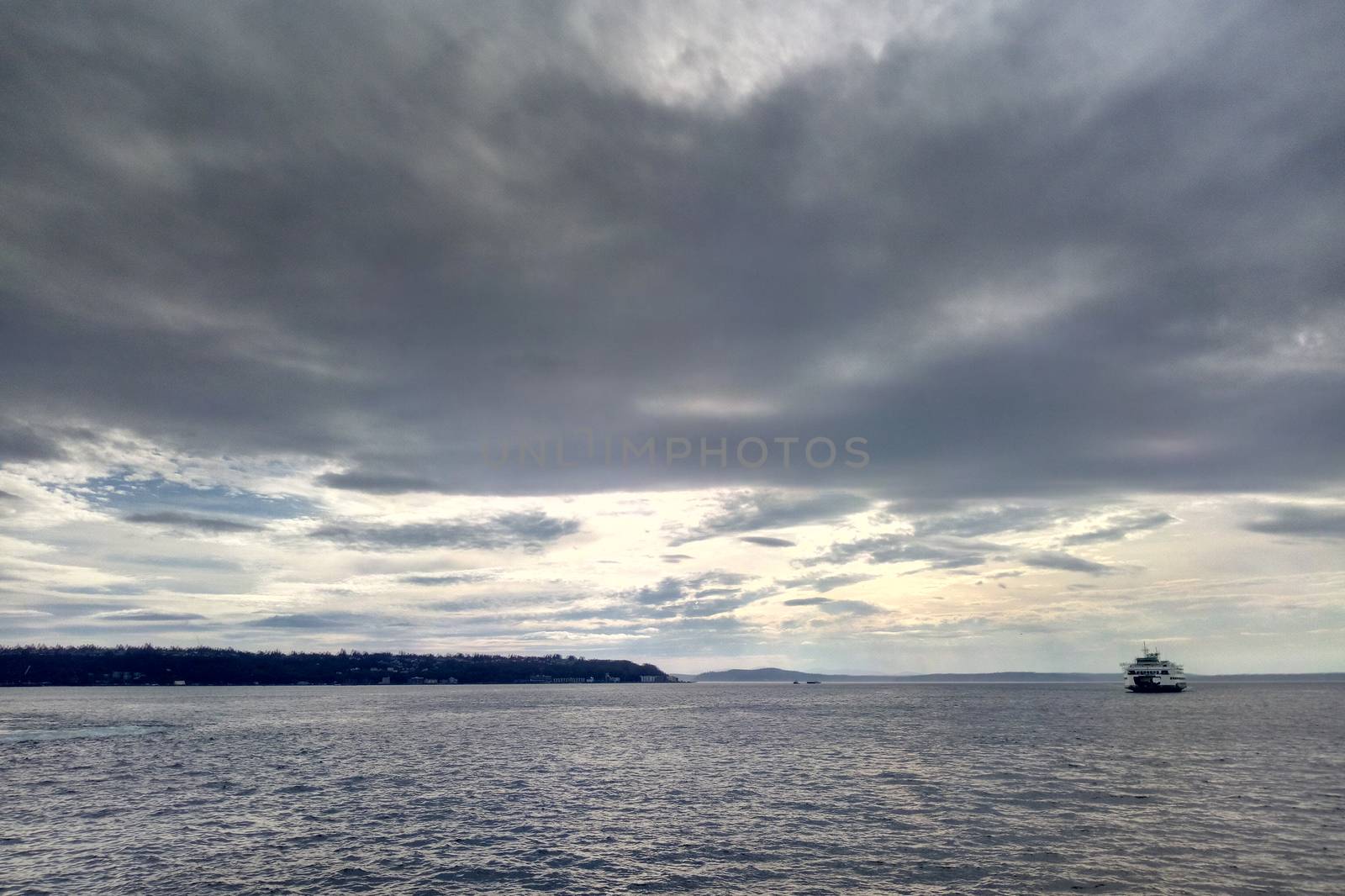 Beautiful ocean view with a ship on the horizon