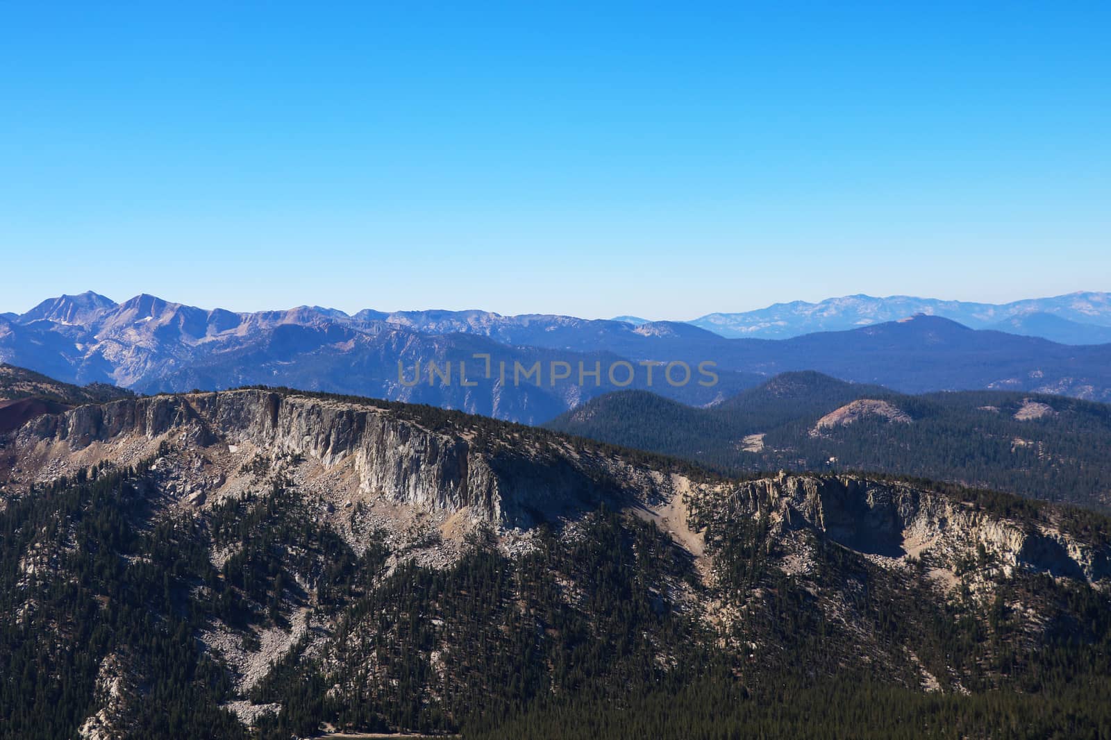 Beautiful mountains against the blue sky. Top view of top of mountain by kip02kas