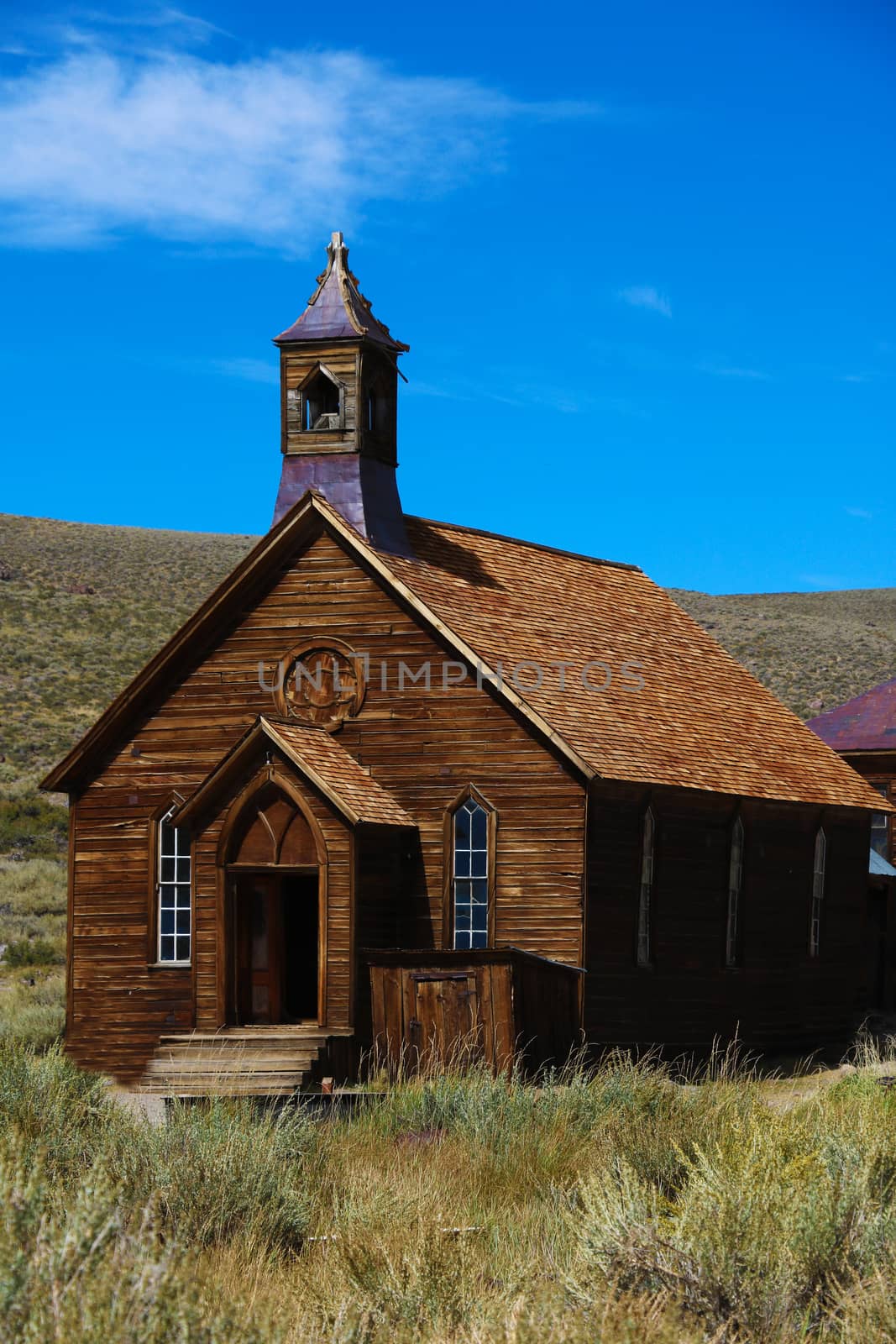 Beautiful view of the church. Old church in a ghost town on a sunny day.