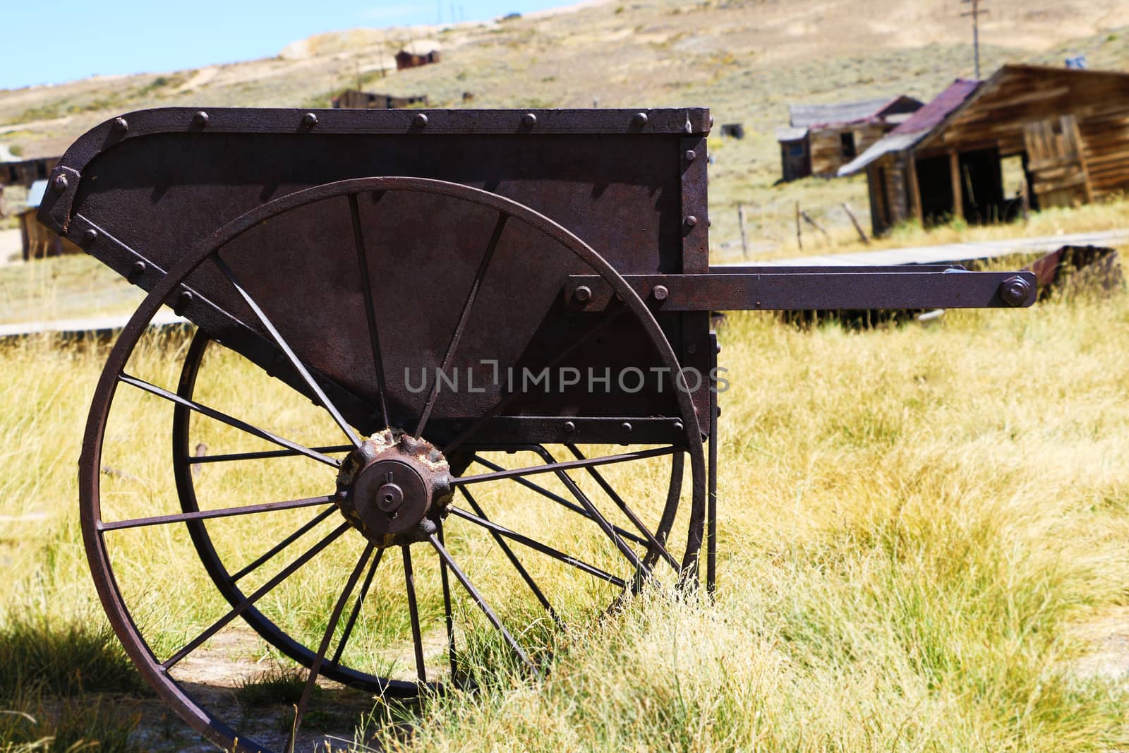 Old rusty car standing in a grass field by kip02kas