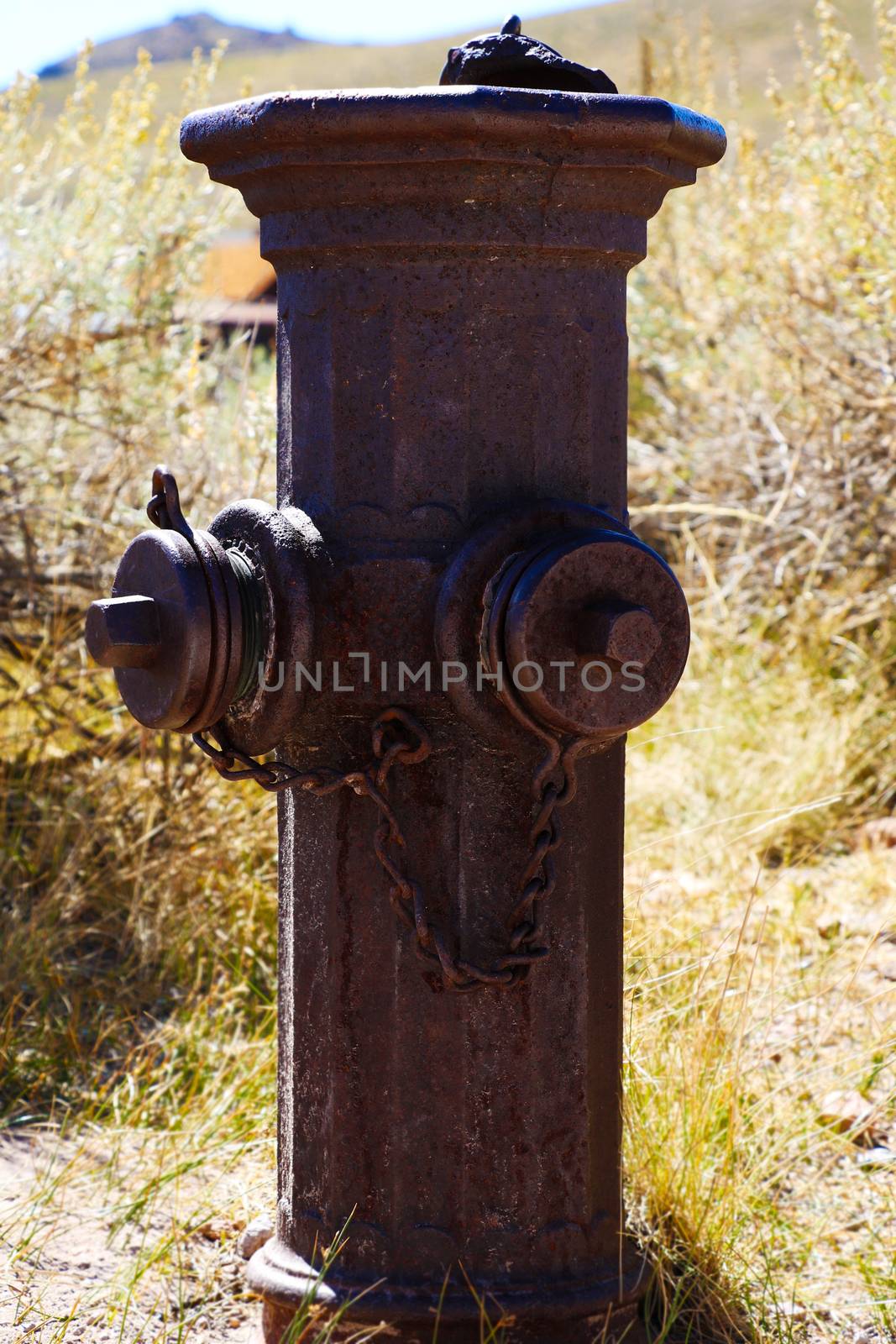 Old city fire hydrant to connect hoses to the water supply by firefighters during a fire