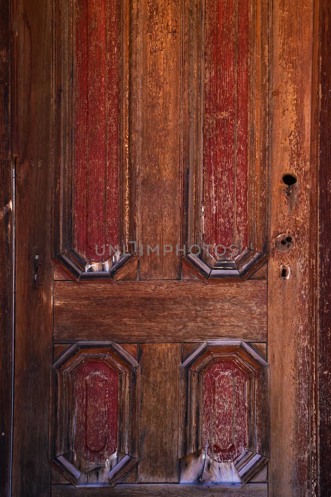 Old wooden door without door lock and handle, background