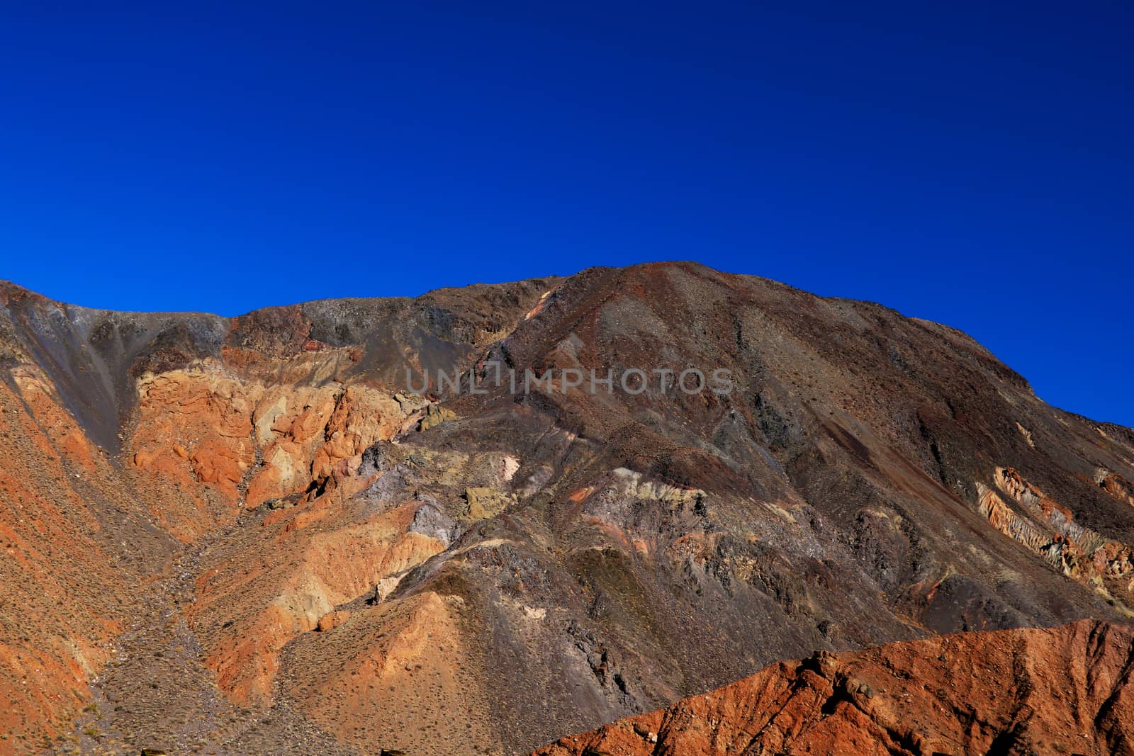 Moon Over Zabriskie Point Mudstones form Badlands Death Valley National Park California. by kip02kas