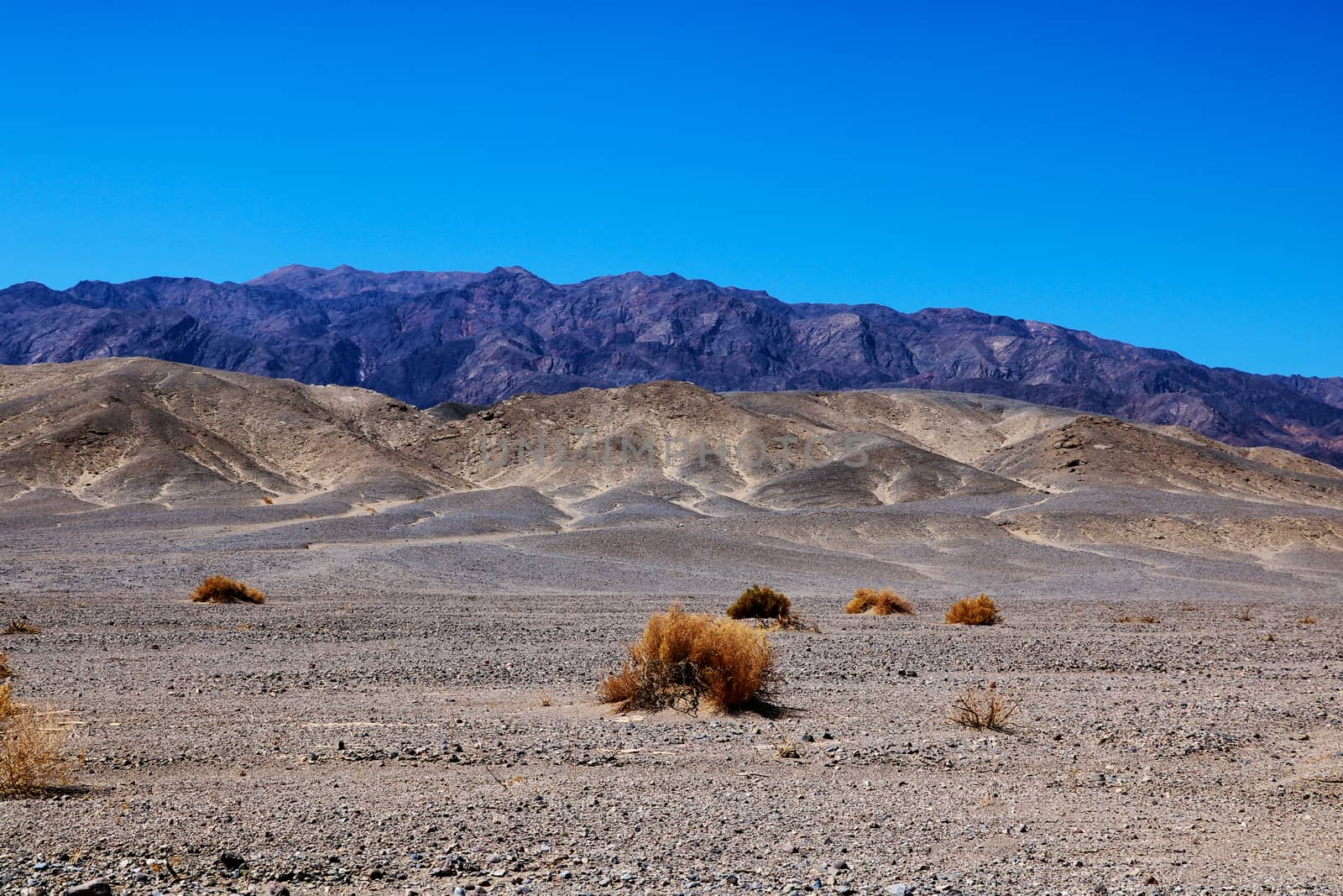 View from highway 190 towards salt flats of Badwater Basin, Death Valley, California. by kip02kas