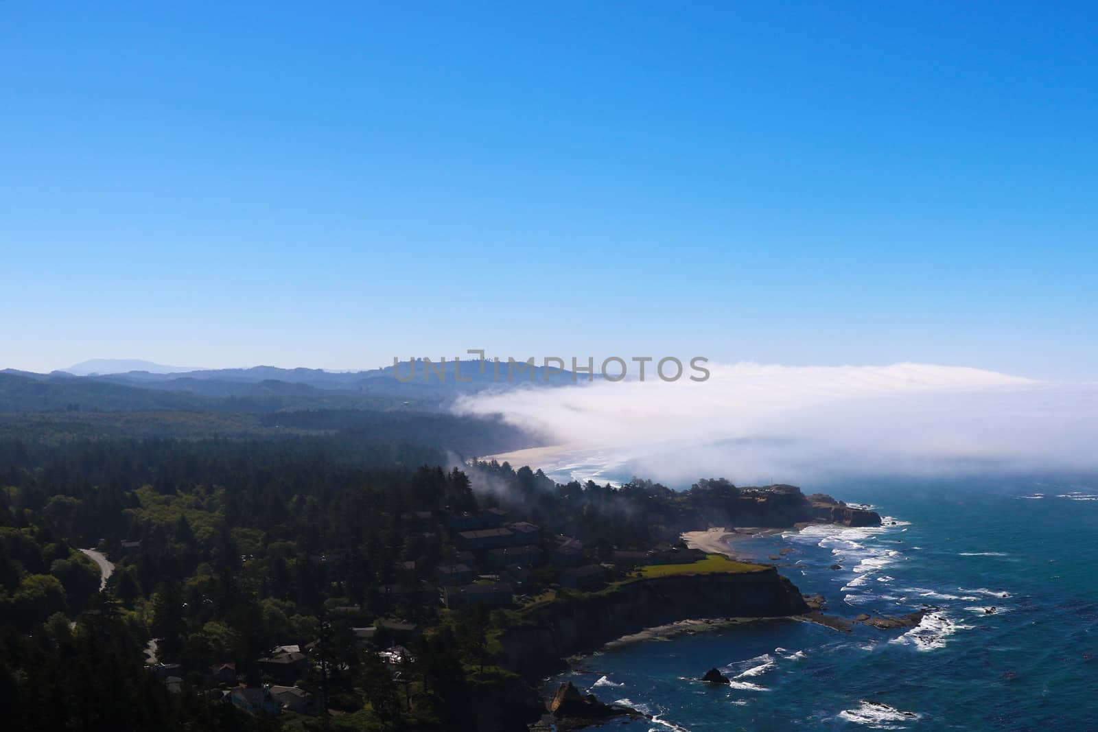 Sunset on a misty beach along the Pacific Ocean in California by kip02kas