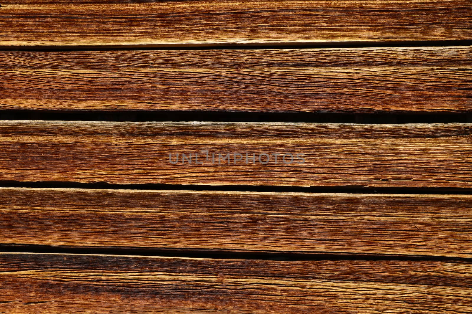brown wooden plank desk table background texture top view by kip02kas