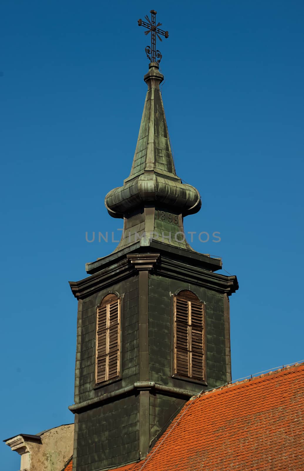 Black bell tower at orthodox church in Serbia