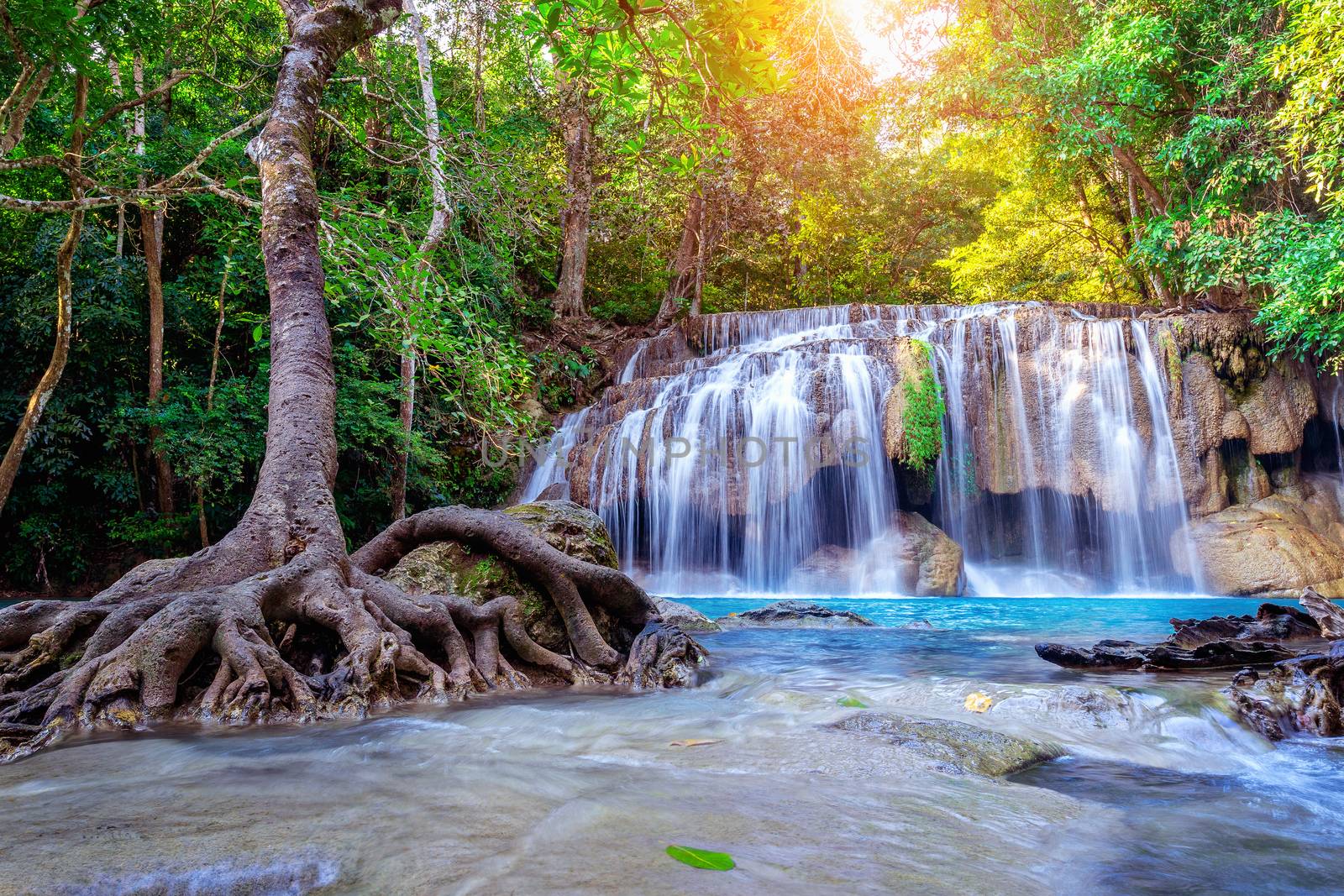 Erawan waterfall in Thailand. Beautiful waterfall with emerald pool in nature. by gutarphotoghaphy