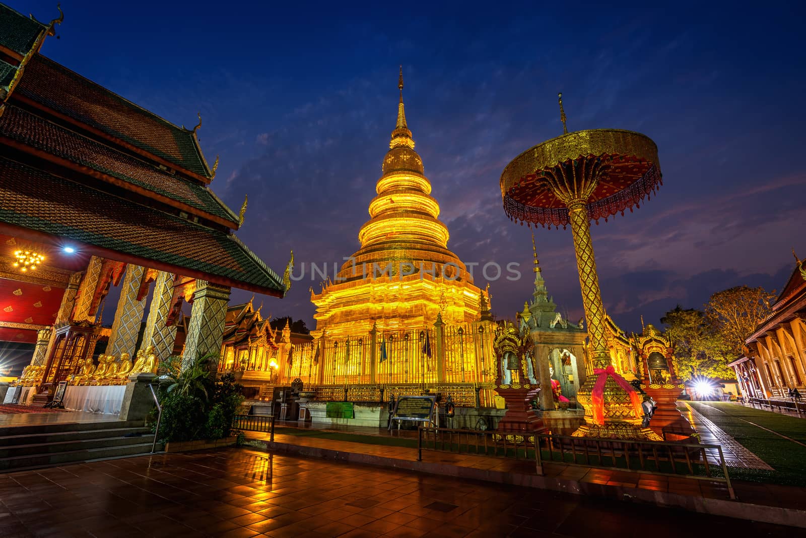 Wat Phra That Hariphunchai temple in Lamphun, Thailand. by gutarphotoghaphy