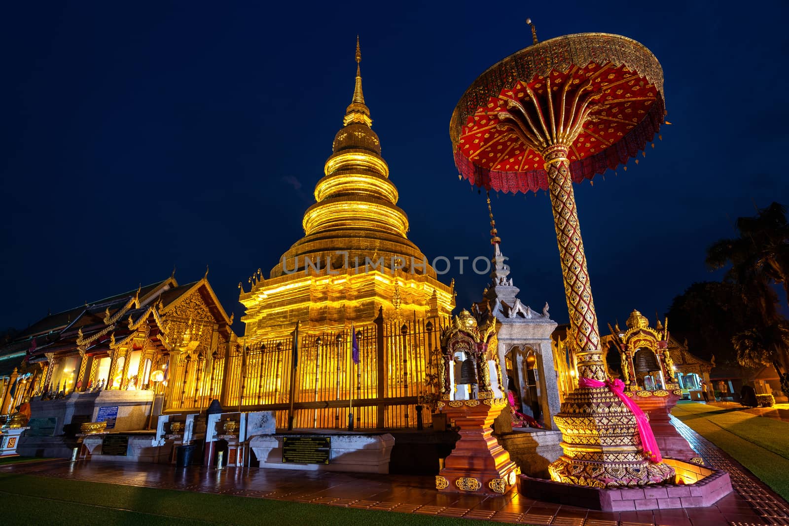 Wat Phra That Hariphunchai temple in Lamphun, Thailand. by gutarphotoghaphy
