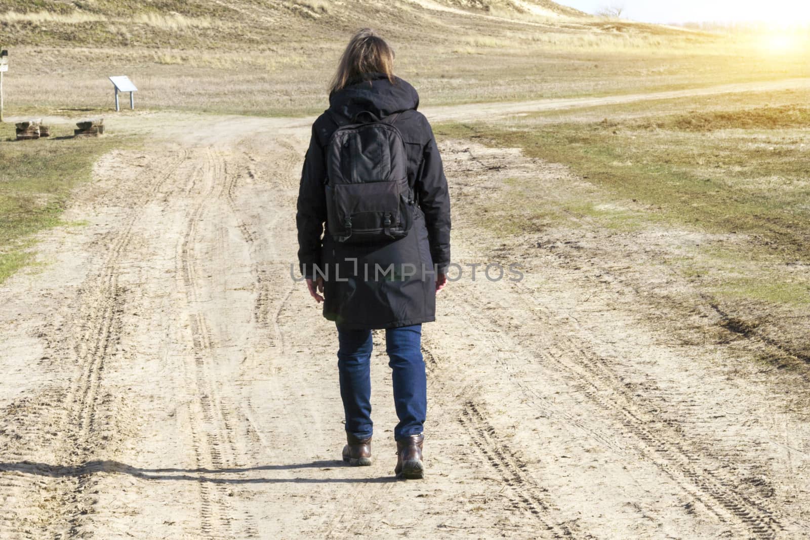 Caucasian woman in black coat