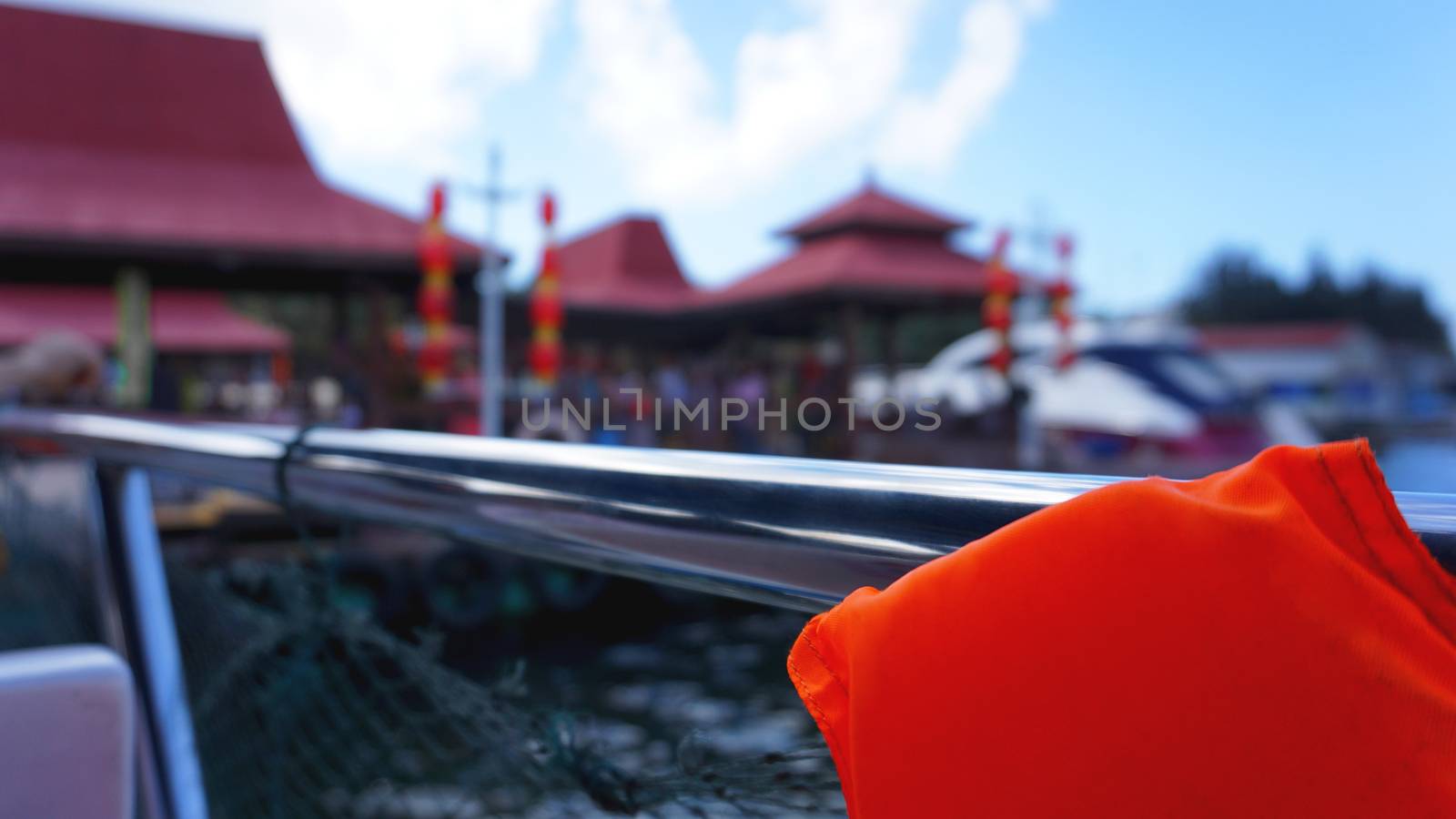 Life jacket and net on boat by natali_brill