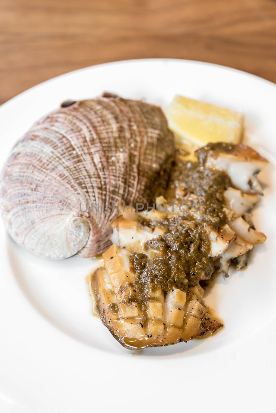 grilled Japanese Abalone steak with lemon