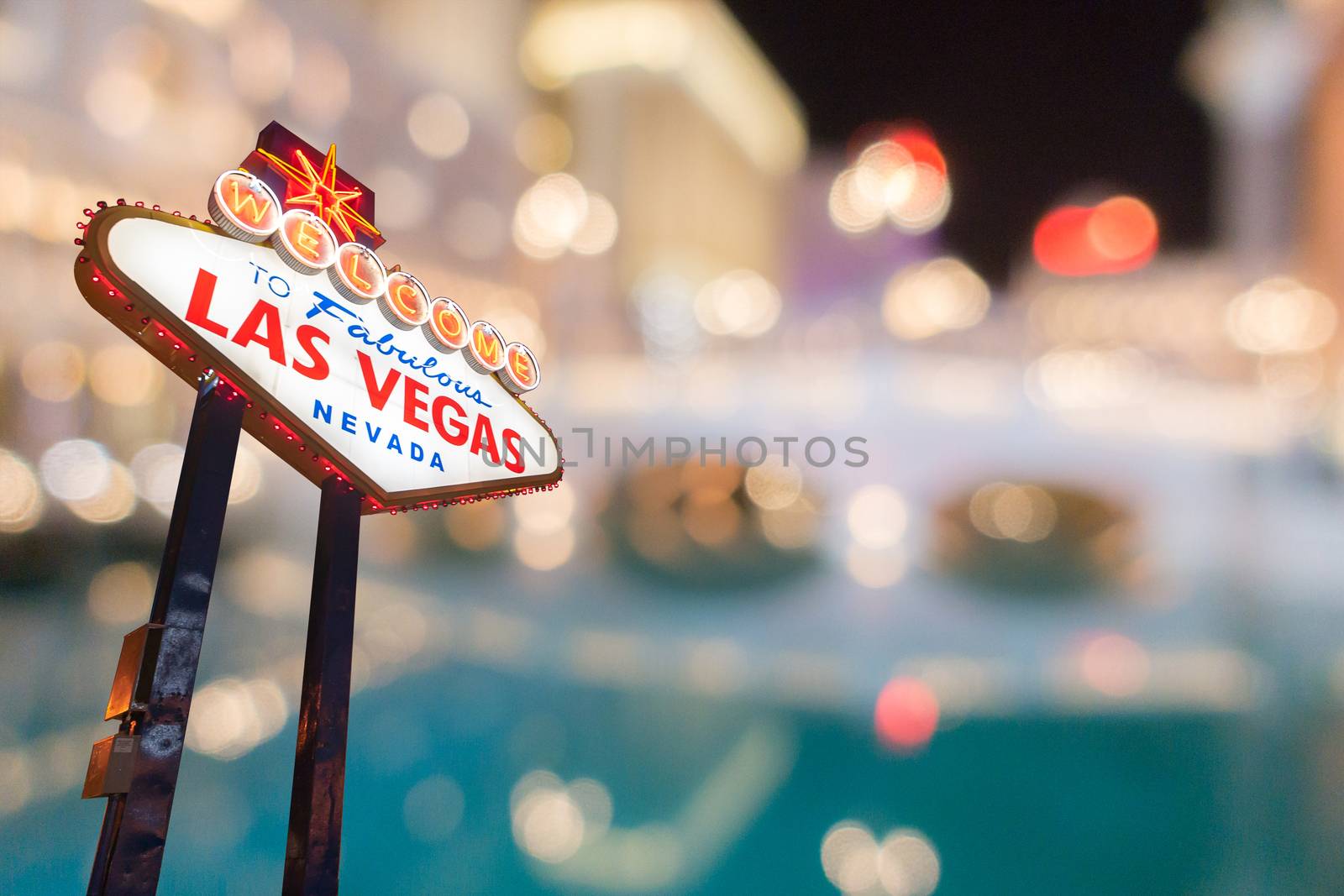 Famous Las Vegas sign with blur cityscape by vichie81