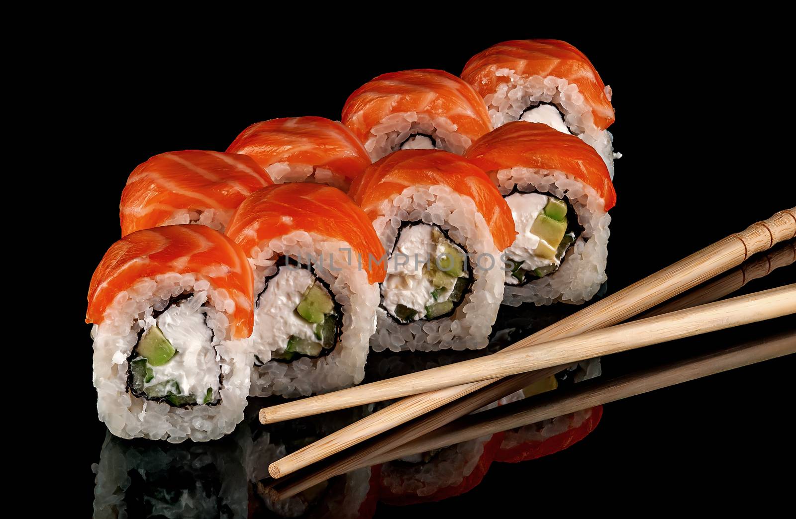 Sushi rolls Philadelphia with chopsticks by Cipariss