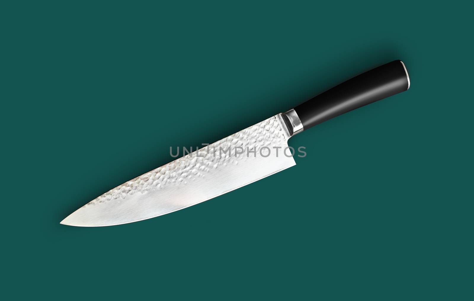 Chef's knife for your kitchen isolated on green by SlayCer