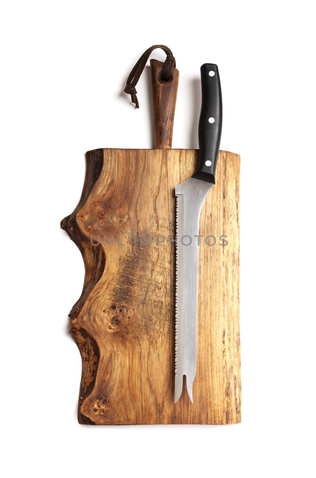 Knife Serrated for kitchen on old wooden cutting Board by SlayCer
