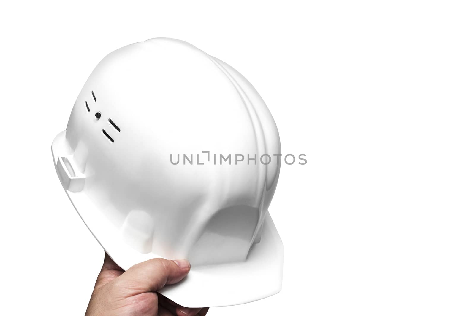Construction white helmet, head protection in hand men. Isolated on white background