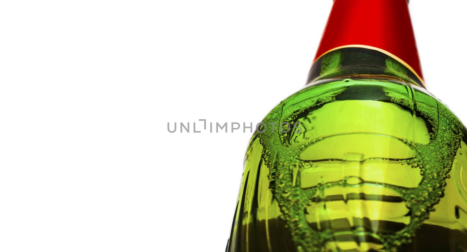 Green Bottle of beer close-up isolated on white by SlayCer