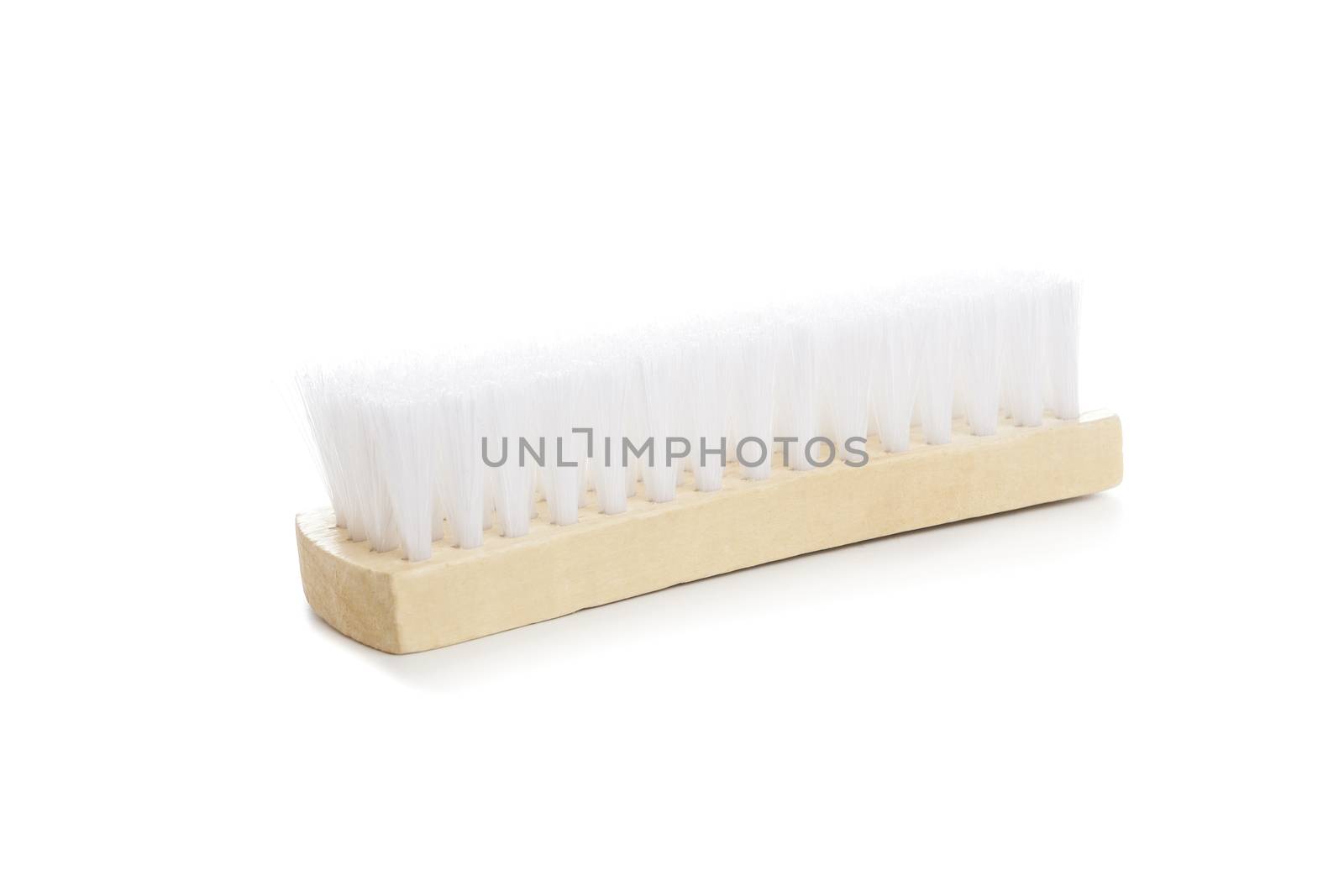 clothes cleaning brush close-up isolated on white background by SlayCer